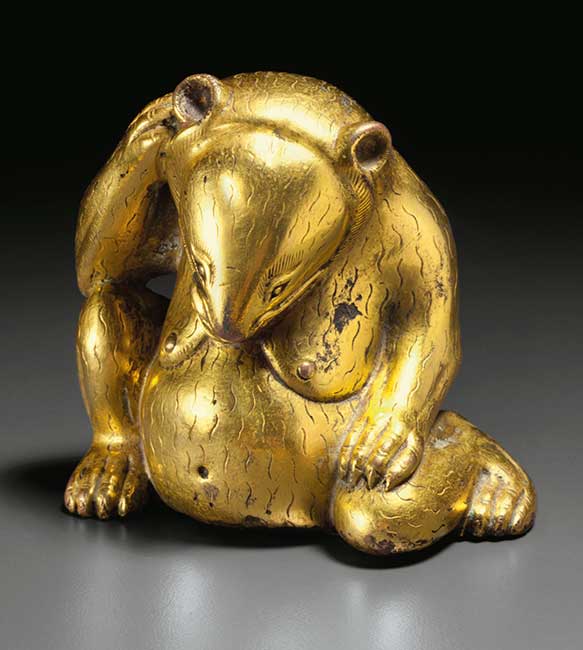 A SUPERB GILT-BRONZE FIGURE OF A SEATED BEAR CHINA, WESTERN HAN DYNASTY (206 BC-AD 8)