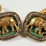 A GOOD PAIR OF RUSSIAN SILVER GILT, ENAMEL AND DIAMOND CUFFLINKS