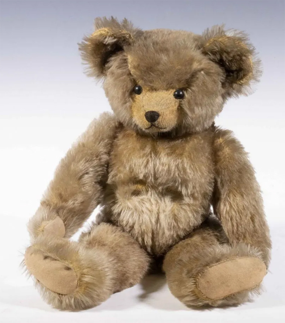 Early 20th c. Jointed Bear, with glass eyes, stitched nose, mouth and paws